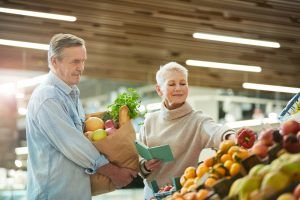 Senior Couple Grocery Shopping at Farmers Market